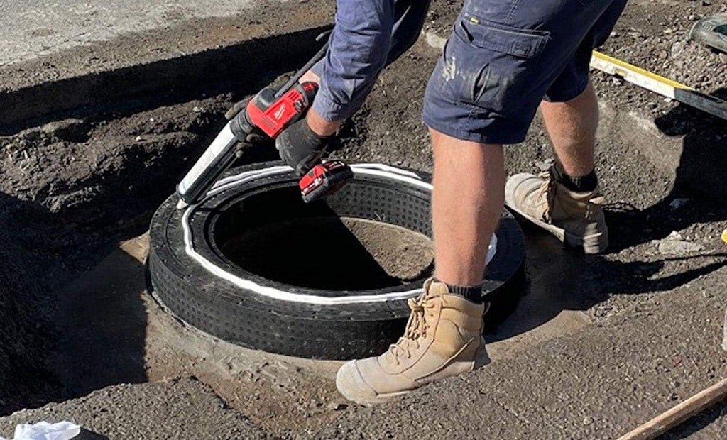 Utility Employs Better Technology to Raise Exposed Manhole to Grade