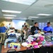 Vac-Con employees collect clothing, school supplies